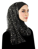 White varied sized dots on black over a black lycra under hijab and matching black satin trim